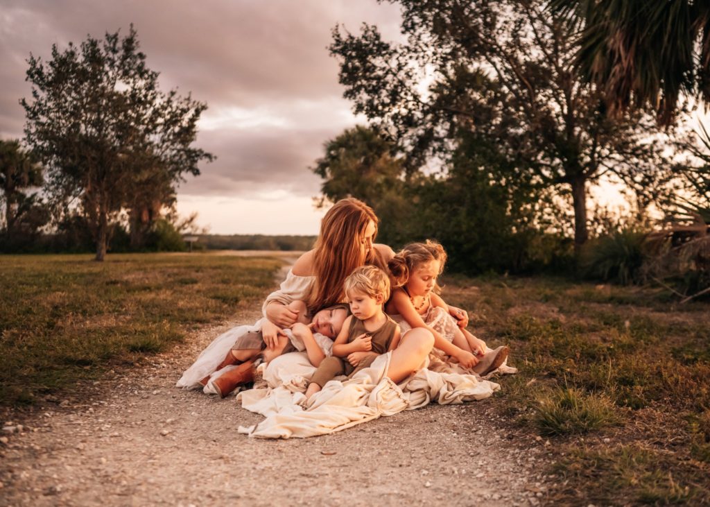 mom-holding-children-snuggles-lifestyle-photography