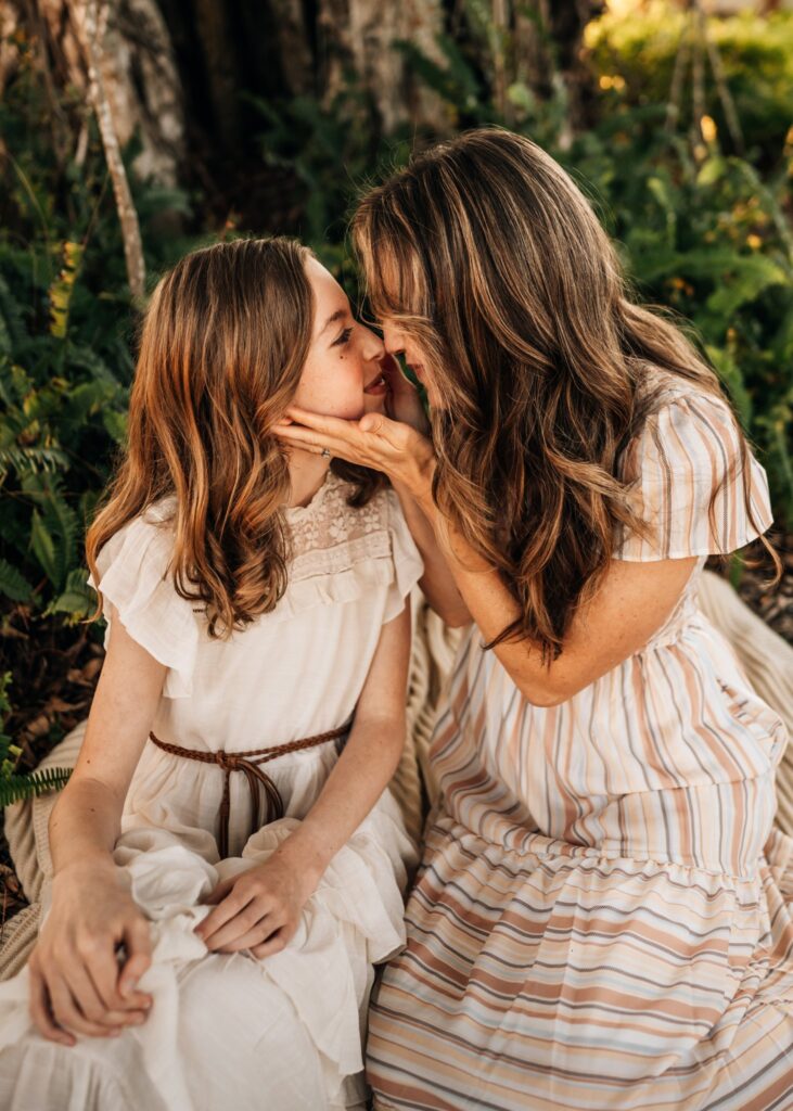 mother-and-daughter-giving-eskimo-kisses