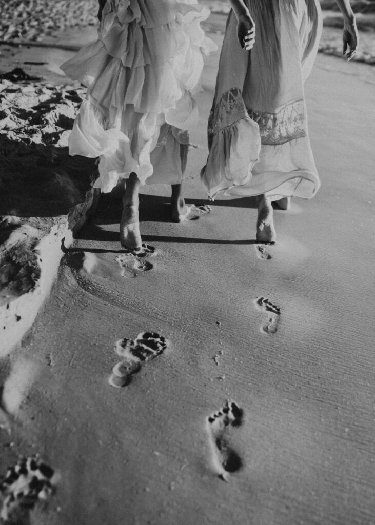mother-and-daughter-footprints-in-sand