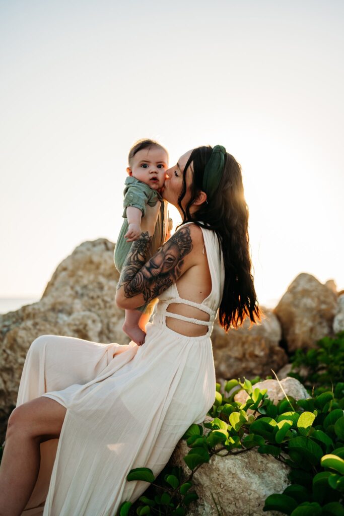 mother-kissing-baby-beach-portraits