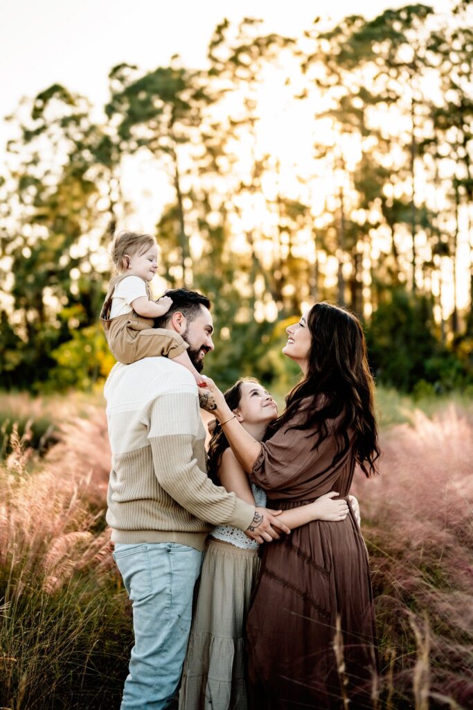 Family-smiling-sunset-lifestyle-portraits-chasing-creative